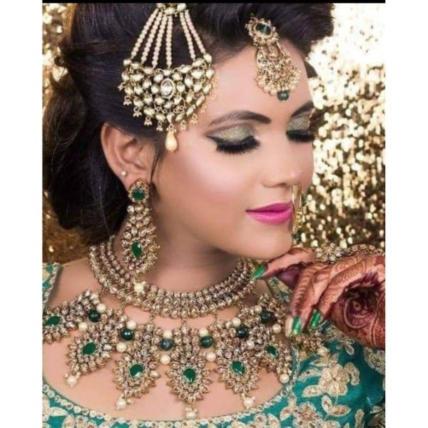 Elegant Golden & Green Kundan Set on rent