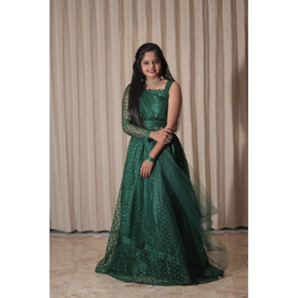 "Emerald Elegance: Green Designer Choli with Lehenga & Belt" on rent