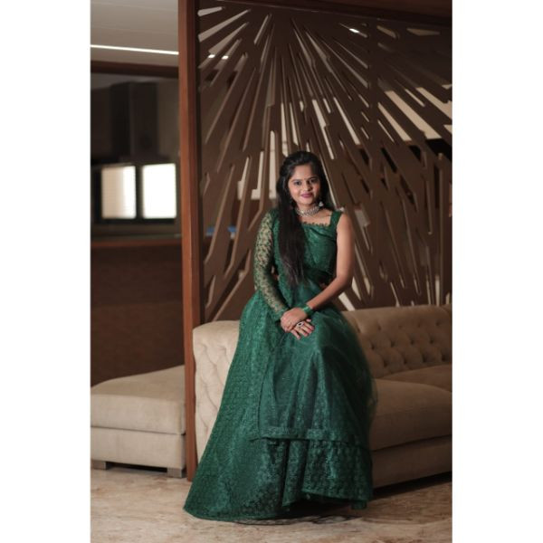 "Emerald Elegance: Green Designer Choli with Lehenga & Belt" on rent