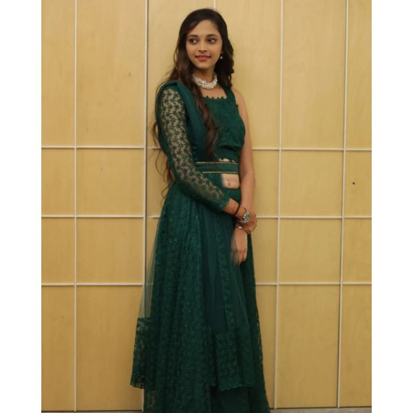 "Emerald Elegance: Green Designer Choli with Lehenga & Belt" on rent