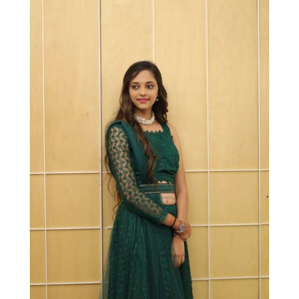 "Emerald Elegance: Green Designer Choli with Lehenga & Belt" on rent