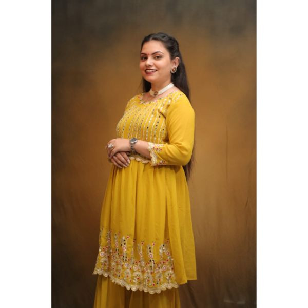 "Radiant Sunshine: Yellow Sharara Haldi Outfit"
 on rent