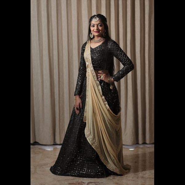 "Elegance Personified: Black Sequence Choli with Lehenga & 2 Dupattas" on rent